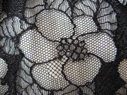 detail of a lace camelia, Chanel 05a skirt