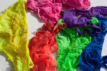 Assortment of Deborah Marquit lingerie in neon colors