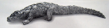 Closeup of the gator made of foil on the Publix Aluminum Foil box
