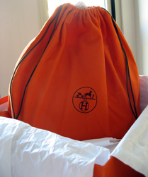 Hermes orange dust bag has been replaced