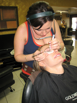 Jessica applying permanent eyelashes