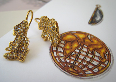 Custom earrings by Sharon Khazzam to wear with her World Pendant