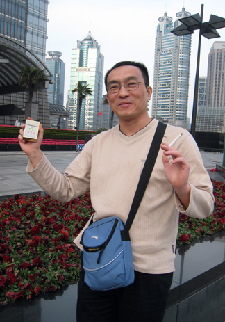 Liu Wei with his brand of cigarettes