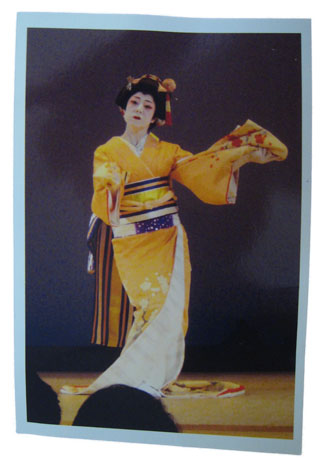 Motoko on stage in traditional costume