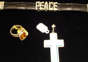 Loree Rodkin ring, belt buckle and turquoise cross
