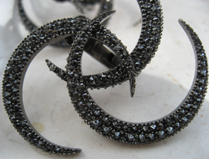 closeup of the VBH black diamond earrings